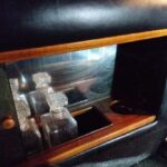 Vintage car door compartment with crystal perfume bottles