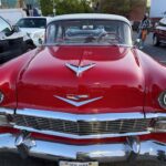 Front view of red 1950s Chevrolet classic car