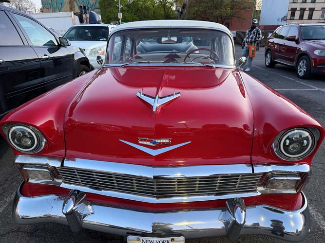 Front view of red 1950s Chevrolet classic car