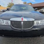Front view of black Lincoln sedan in parking lot