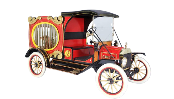 Vintage circus car with caged tiger display