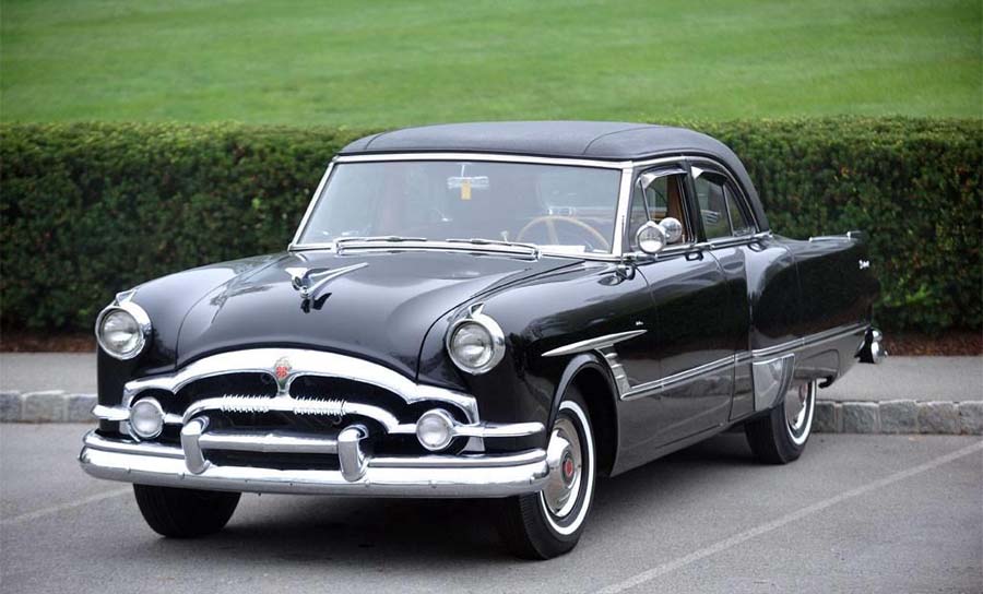 Black 1950s vintage classic car parked outdoors