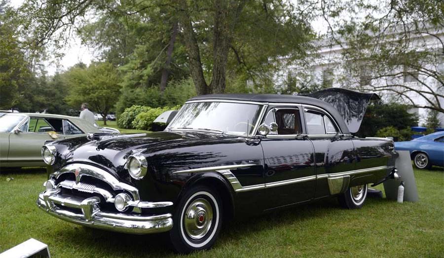 Black 1950s vintage sedan at outdoor car show