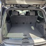 Open SUV trunk with rear seats upright