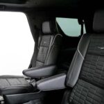 Black leather second-row captain seats in SUV interior