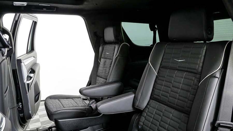 Black leather second-row captain seats in SUV interior