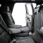 Black leather SUV interior with second-row captain seats
