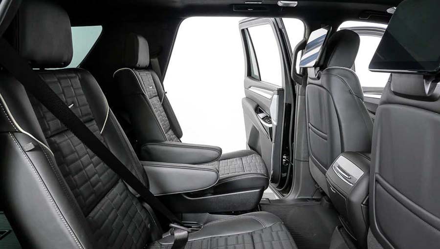 Black leather SUV interior with second-row captain seats