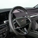 Modern luxury car interior with digital dashboard and console