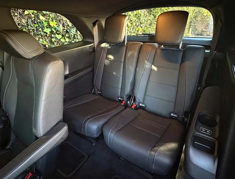 Black leather third-row seats inside SUV