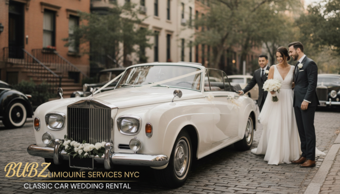 Bride and groom beside vintage white wedding car