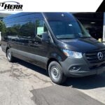 Black Mercedes-Benz Sprinter cargo van at dealership