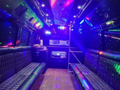 Luxury party bus interior with colorful LED lights