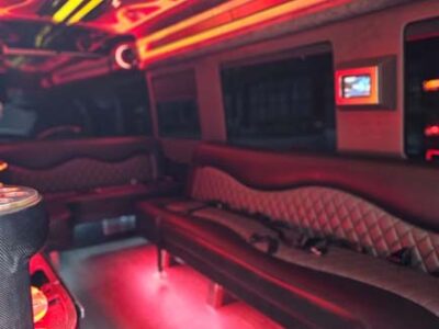 Luxury limousine interior with red neon lighting