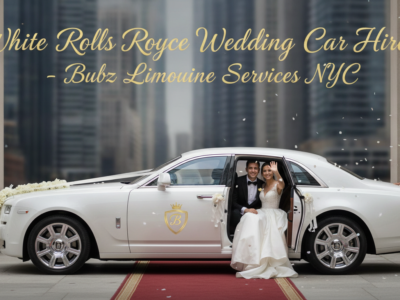 Bride and groom in white Rolls-Royce wedding car