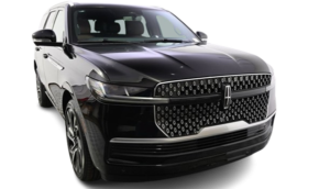 Black luxury SUV with patterned grille, front view