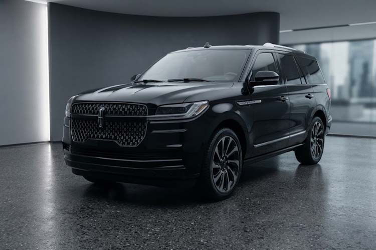 Black luxury SUV displayed in a modern showroom