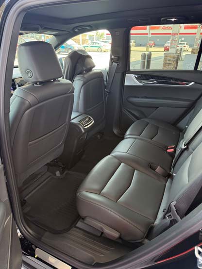 Black leather rear seats inside a modern SUV