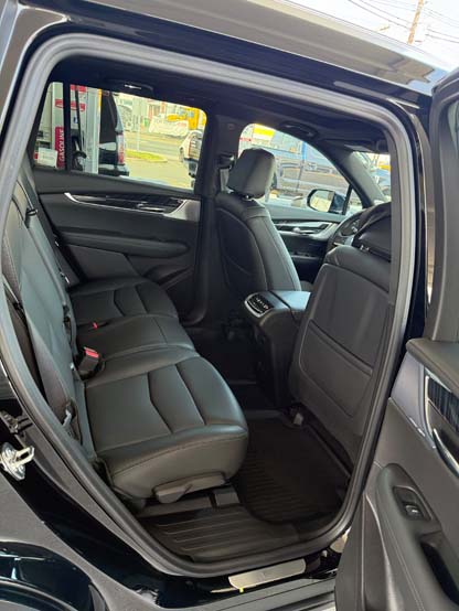 Black leather rear seats inside a modern SUV