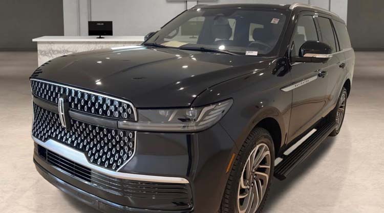Black Lincoln Navigator luxury SUV displayed in showroom