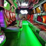 Luxury limousine interior with leather seats and neon lighting