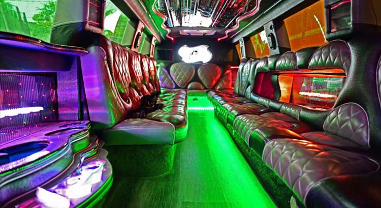 Luxury limousine interior with leather seats and neon lighting